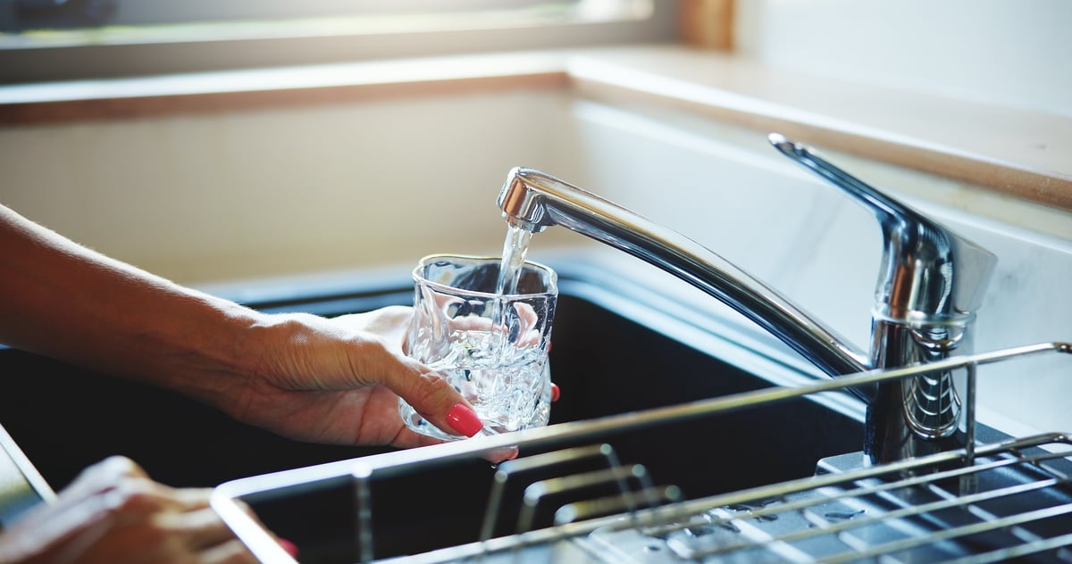 Clean water flowing from tap